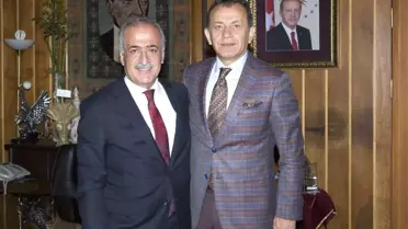 Prof. Dr. Serdar Sevimli ve TRT Türk Halk Müziği Sanatçısı Yavuz Değirmenci Rektör Çomaklı'yı...