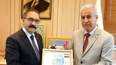 Irak Türkmen Cephesinden Gaün Rektörü Prof. Dr. Gür'e Takdirname
