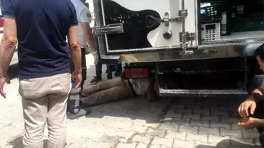 Hareket eden kamyonetin altında kalan sürücü yaralandı