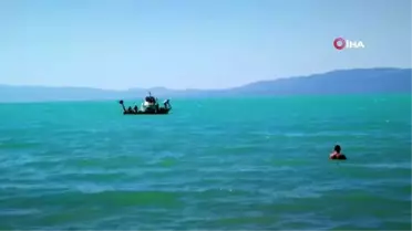 Serinlemek için girdiği gölde kayboldu