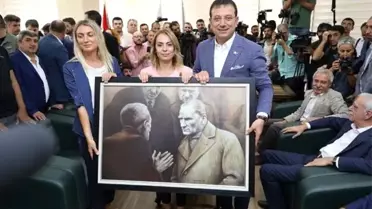 İmamoğlu, görevden alınan HDP'li belediye başkanına, kayyumun İBB'den indirdiği Atatürk portresini hediye etti