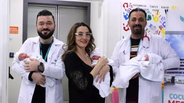 50 yaşında üçüzleri kucağına aldı