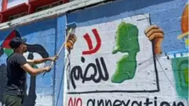 Filistinli gençler, İsrail'in ilhakını grafiti çizerek protesto etti