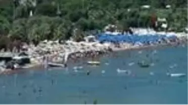 Türkiye'nin en temiz koyunda denizin, güneşin tadını doyasıya çıkarıyorlar