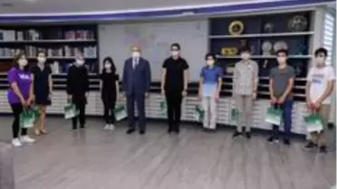 Başkan Özlü başarılı öğrencileri ödüllendirdi