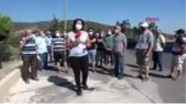 İZMİR'DE ÇÖP KOKUSUNA VATANDAŞLARDAN ÇİFT KATLI MASKE ÖNLEMİ