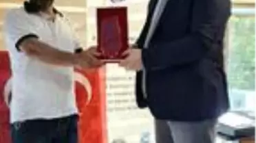 Kadını, tüfekli eşinden kurtaran oto yıkamacıya ödül