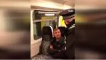 İngiltere'de trende maske takmayan yolcuya polis şiddeti