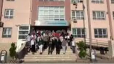 Germencik'te temassız çöp kovası geliştiren öğretmenlere sertifika