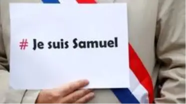 Fransa'da binlerce kişi meydanlarda başı kesilerek öldürülen öğretmen Samuel Paty'yi andı ve saldırıyı kınadı
