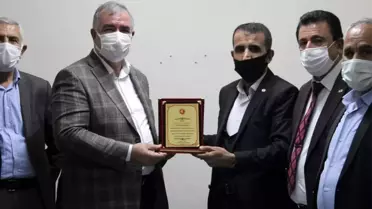Muhtarlardan Başkan Turanlı'ya teşekkür plaketi