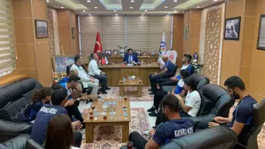 Muş TSO Başkanı Erdal Koç, kayaklı koşu sporcularını makamında ağırladı