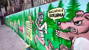 Bahçe duvarlarına çizilen karikatür ile ormanların önemi anlatıldı
