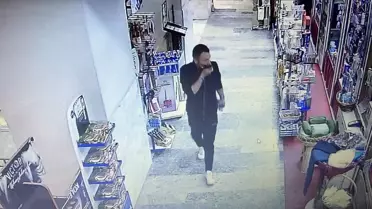 Yanında getirdiği çöp poşetiyle dizüstü bilgisayar çaldı