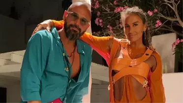 Sosyetik isim Eda Taşpınar tanga bikinisiyle sevgilisinin sırtında poz verdi