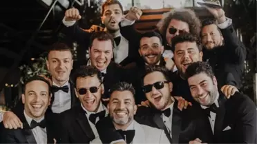 Oğuzhan Koç ile Demet Özdemir'in düğününde çekilen toplu fotoğrafı küfürle paylaştı