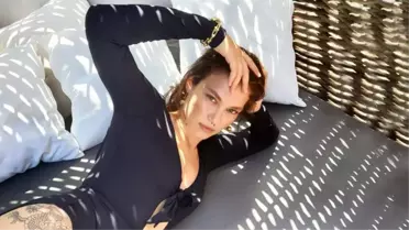 Melisa Şenolsun'un göbeğine kadar inen göğüs dekolteli elbisesi Instagram'ı salladı