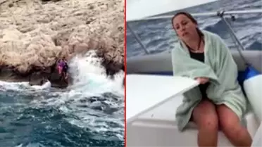 Antalya'da kayalıklarda mahsur kalan tatilcileri tur teknesi personeli kurtardı! O anlar kamerada
