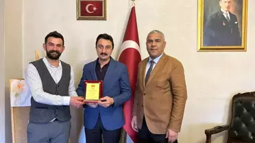 Kars 36 Spor yönetiminden Alibeyoğlu'na plaket
