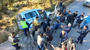 Şarampole düşen araca 'örümcek ağlı' önlem