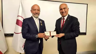Dr. Suat İrfan Günsel'e 'TÜRKSOY 30. Yıl Altın Madalyası' takdim edildi