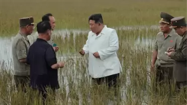 Kim Jong Un Sel Felaketinin Ardından Gömlek ve Mandal Tercihini Sergiledi