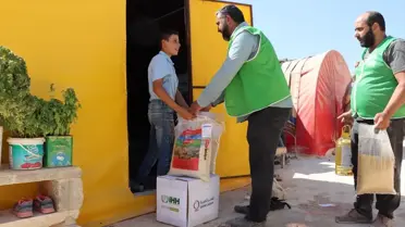 İHH ve Katar Charity, Cinderes'teki depremzedelere gıda yardımı yaptı