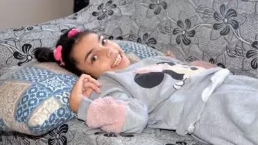 Hüsna Nur'u, annesi 9 yıldır kucağında taşıyor