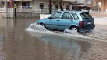 Burhaniye'de Yağmurun Etkisi: Karınca Deresi Taştı, Köy Yolları Zarar Gördü
