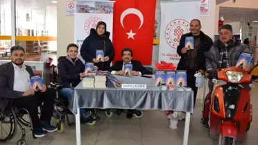Türkiye Sakatlar Derneği Erzurum Şube Başkanı Sadullah Efe, 'Kadere Yolculuk' adlı kitabı için imza günü düzenledi