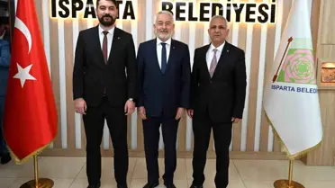 MHP Isparta İl Başkanı ve Yönetimi Belediye Başkanı Şükrü Başdeğirmen'i Ziyaret Etti