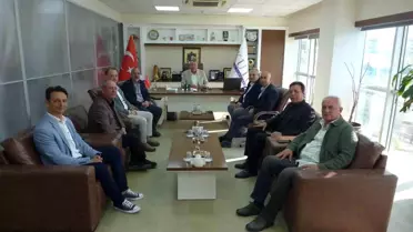 Deniz Ticaret Odası İzmir Şubesi Yönetim Kurulu Başkanı Kuşadası Ticaret Odası'na Ziyaret Gerçekleştirdi