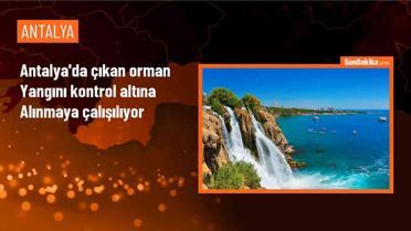 Antalya'nın Aksu ilçesinde ormanlık alanda çıkan yangına müdahale ediliyor