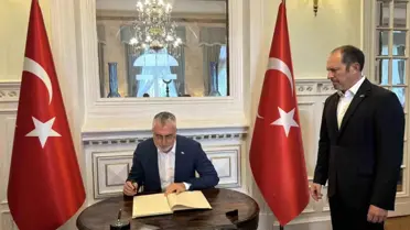 Çalışma ve Sosyal Güvenlik Bakanı Vedat Işıkhan, Türkiye'nin Bükreş Büyükelçiliğini ziyaret etti