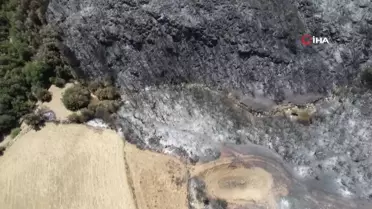 Büyükşehirin dozerleri mahalleyi yanmaktan kurtardı