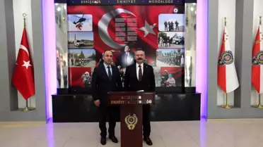 Eskişehir Valisi Hüseyin Aksoy İl Emniyet Müdürü Tolga Yılmaz'a iade-i ziyarette bulundu