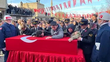 Şehit oğlunu son yolculuğuna 'Allah'ım cennetine al' diyerek uğurladı