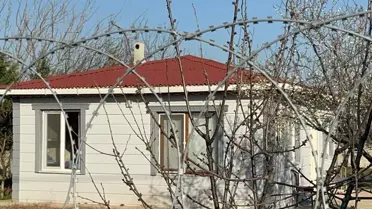 Emekli polis, tartıştığı eşini eşarpla boğdu