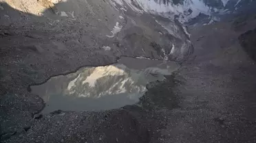 Kırgızistan'da Dağ Gölü Taşarak 950 Kişi Tahliye Edildi