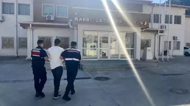 Kuşadası'nda Aranan Şahıs Sahilde Yakalandı