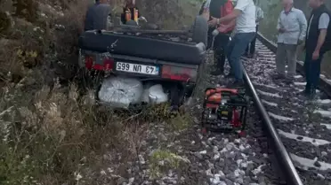 Dursunbey'de Otomobil Tren Yoluna Uçtu