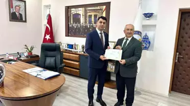 Hisarcık Kaymakamı Bahar'dan milli eğitim çalışanlarına başarı belgesi