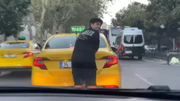 Taksinin Arkasında Patenle Tehlikeli Yolculuk