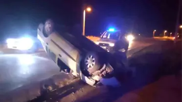 Isparta'da Takla Atan Araçta Sıkışan Sürücü Kurtarıldı