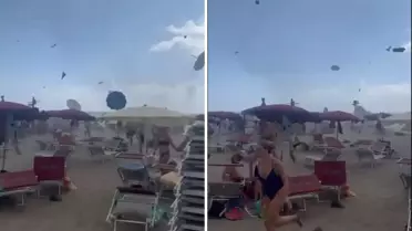 Hortum, plajı savaş alanına çevirdi: Turist canını zor kurtardı