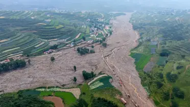 Çin'de Şiddetli Yağışlar: 13 Ölü, 30 Kayıp