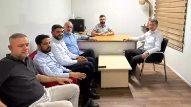 Özhan'dan İHA'ya Ziyaret