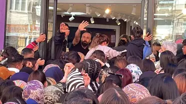 Mağaza açılışında izdiham! Polis ezilme tehlikesi yaşadı