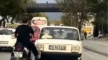 Motosikletli Gençten İlginç Yardım