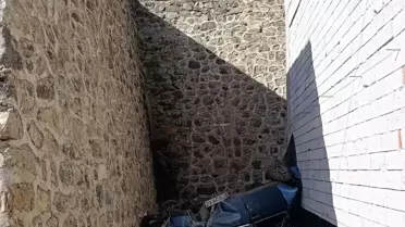 Gümüşhane'de Otomobil Otoparka Düştü